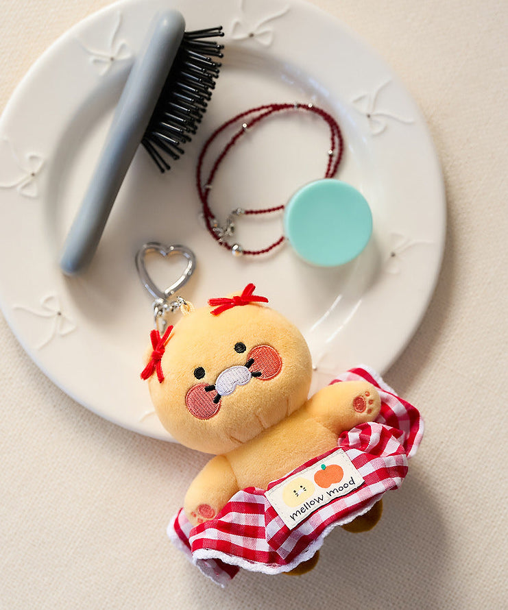 KAKAO FRIENDS Scrunchie Keyring Check : porte-clés scrunchie avec personnage sur fond clair, marque KAKAO FRIENDS.