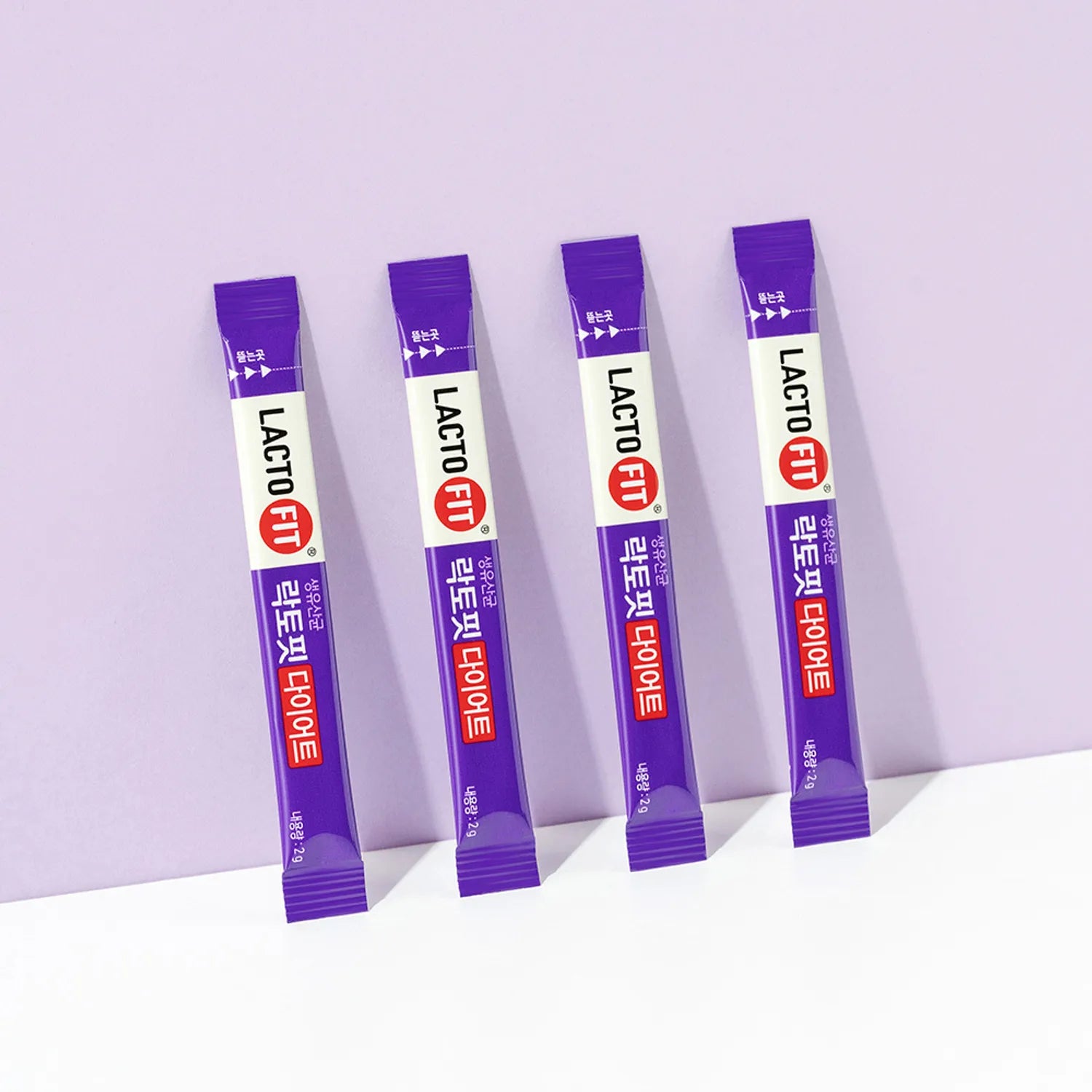LACTO-FIT Diet 60 Sticks 1 Month Supply : bâtonnets LACTO-FIT de la marque, sur fond violet, photo produit