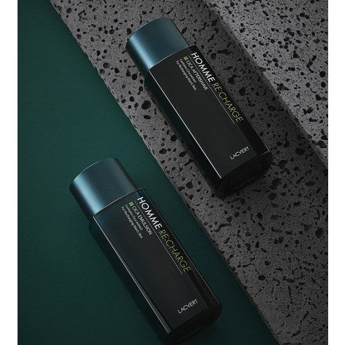 LACVERT Homme Recharge Cica Afer Shave 185ml, flacons posés sur fond minéral noir et vert, visuel produit de marque