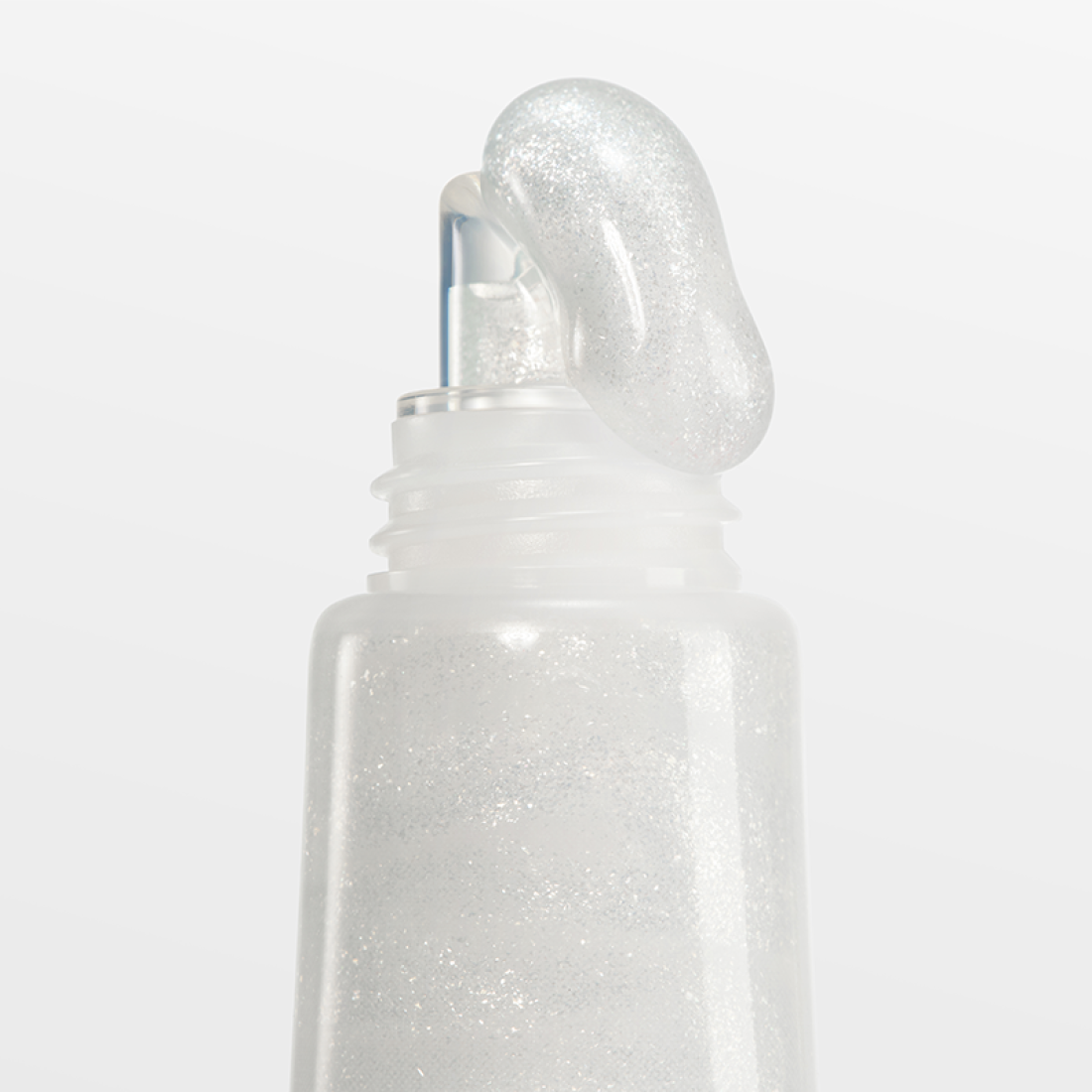 Décris l'image en français en mentionnant le produit, la marque et le contexte visuel : LANEIGE Lip Glowy Balm (Milky Way/Pink Supernova) 10g