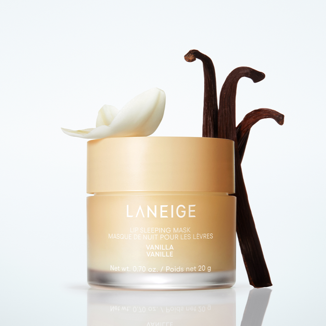 LANEIGE NEW Lip Sleeping Mask 20g, pot crème pour les lèvres de la marque LANEIGE, décor vanille et stick marron.