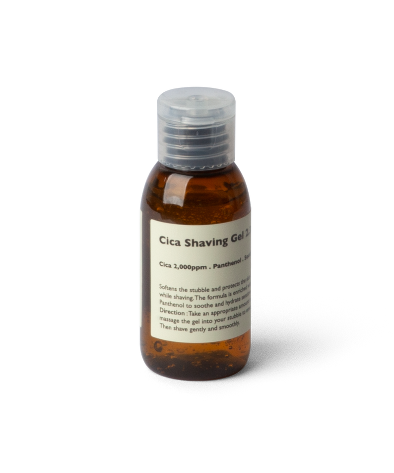 LAZY SOCIETY Cica Shaving Gel 2.3 50ml, flacon brun avec étiquette, gel à raser sur fond noir, marque LAZY SOCIETY.