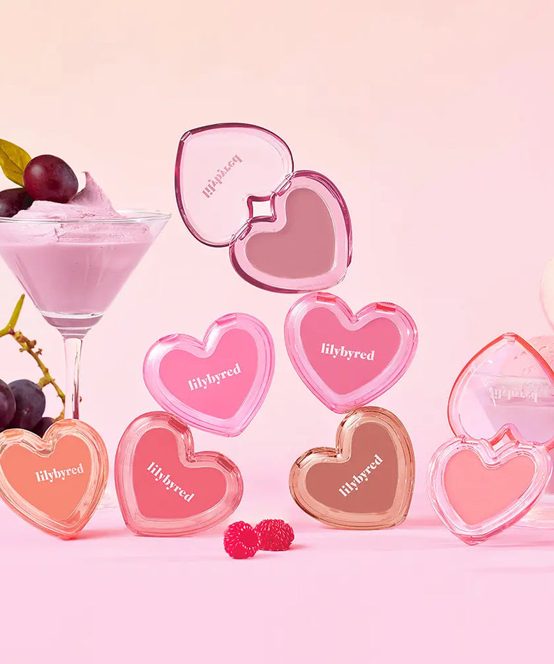 LILYBYRED Love Beam Sherbet Cheek, blush, marque LILYBYRED en visuel rose avec cœurs et cocktail aux fruits