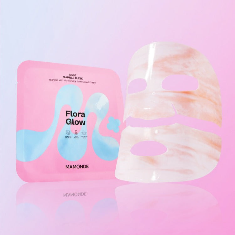MAMONDE Flora Glow Rose Marble Pack : masque marbré rose en packaging sur fond rose pastel, set beauté.