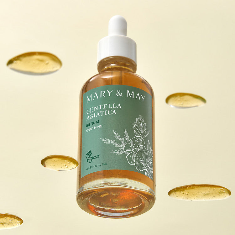 MARY&MAY Herbal Extract Serum 80ml en flacon ambré, marque MARY&MAY, sur fond clair avec capsules de feuilles.