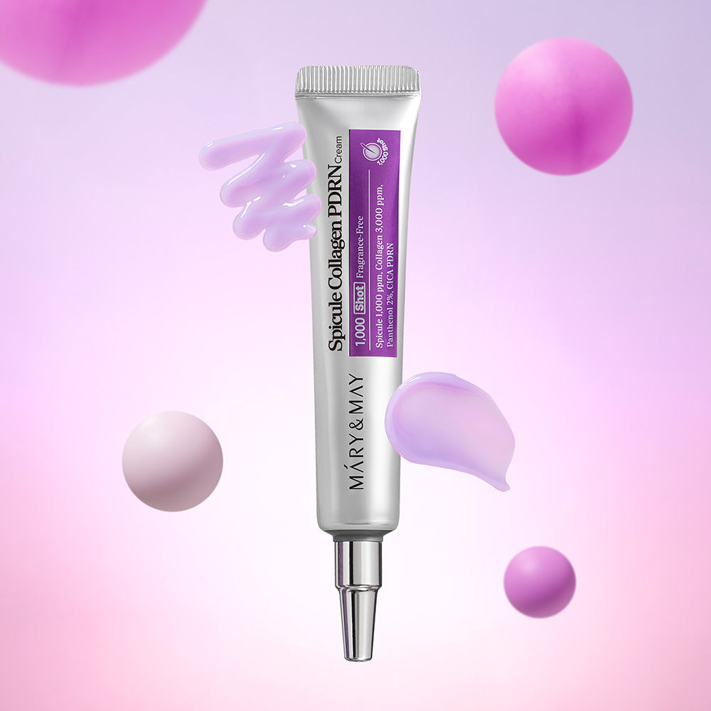Décris l'image en français : MARY&MAY  Speckle Collagen PDRN Cream 15g, tube crème violet sur fond pastel avec gouttes.