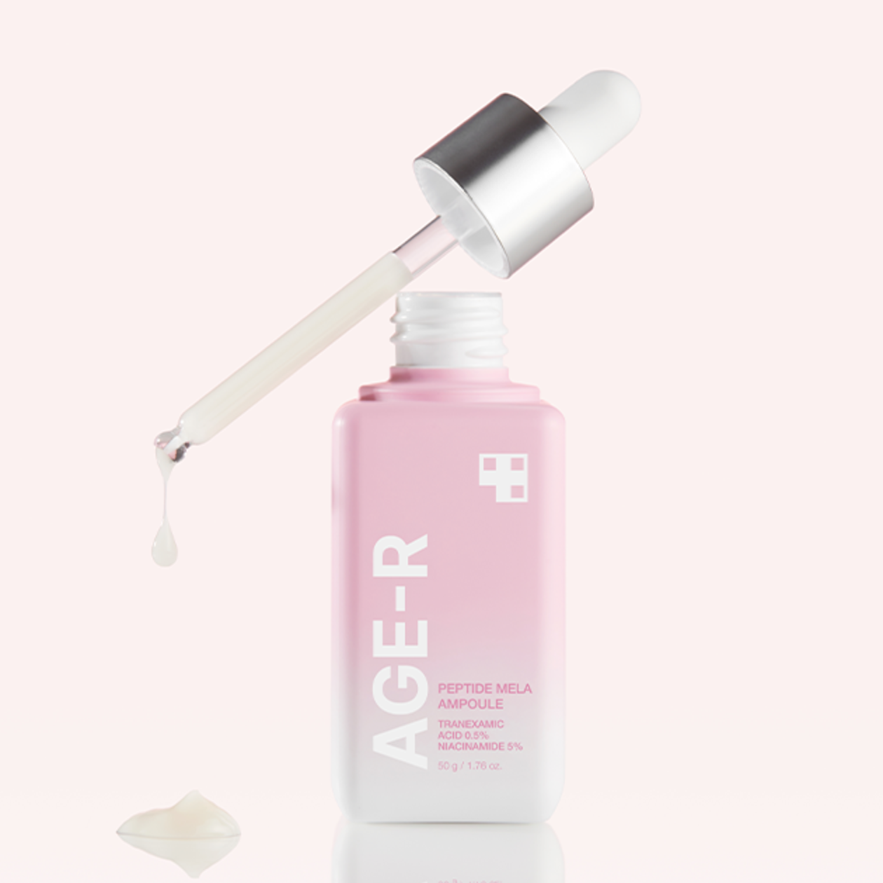 MEDICUBE AGE-R Peptide Mela Ampoule 50g, flacon rose avec pipette sur fond clair, marque MEDICUBE, soin beauté