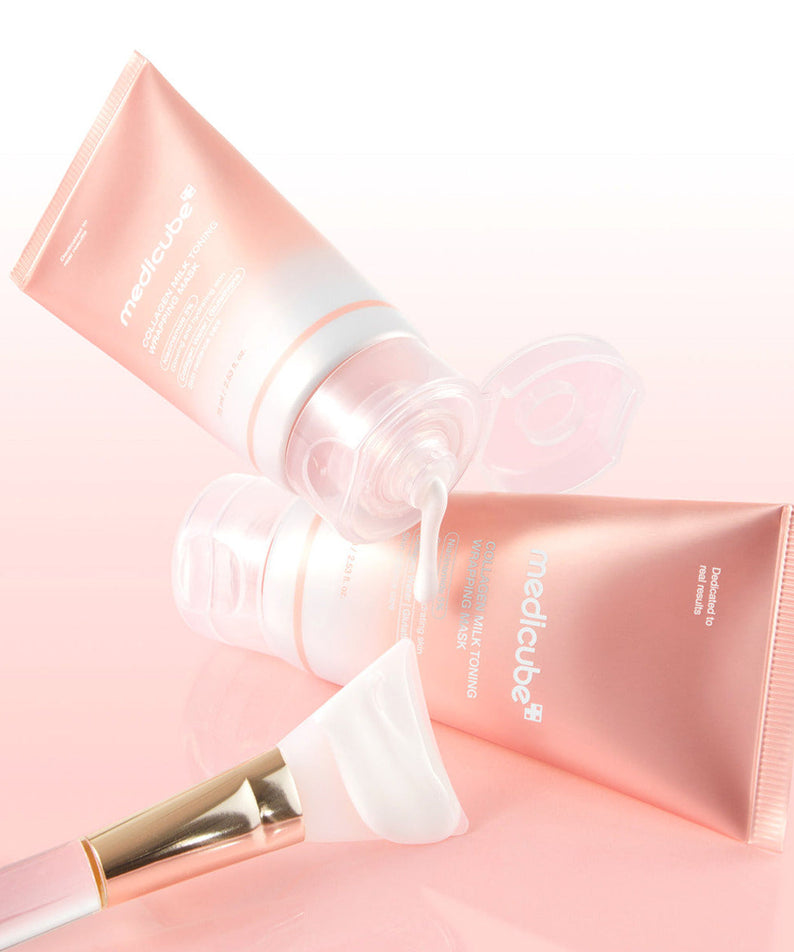 MEDICUBE Collagen Milk Wrapping Mask 80ml de la marque MEDICUBE, tube rose sur fond clair, usage cosmétique.