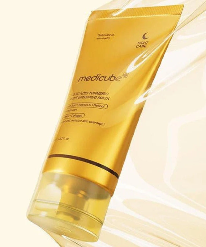 MEDICUBE Kojic Acid Turmeric Vita Wrapping Mask 75ml de la marque MEDICUBE, tube doré sur fond crème, visuel produit
