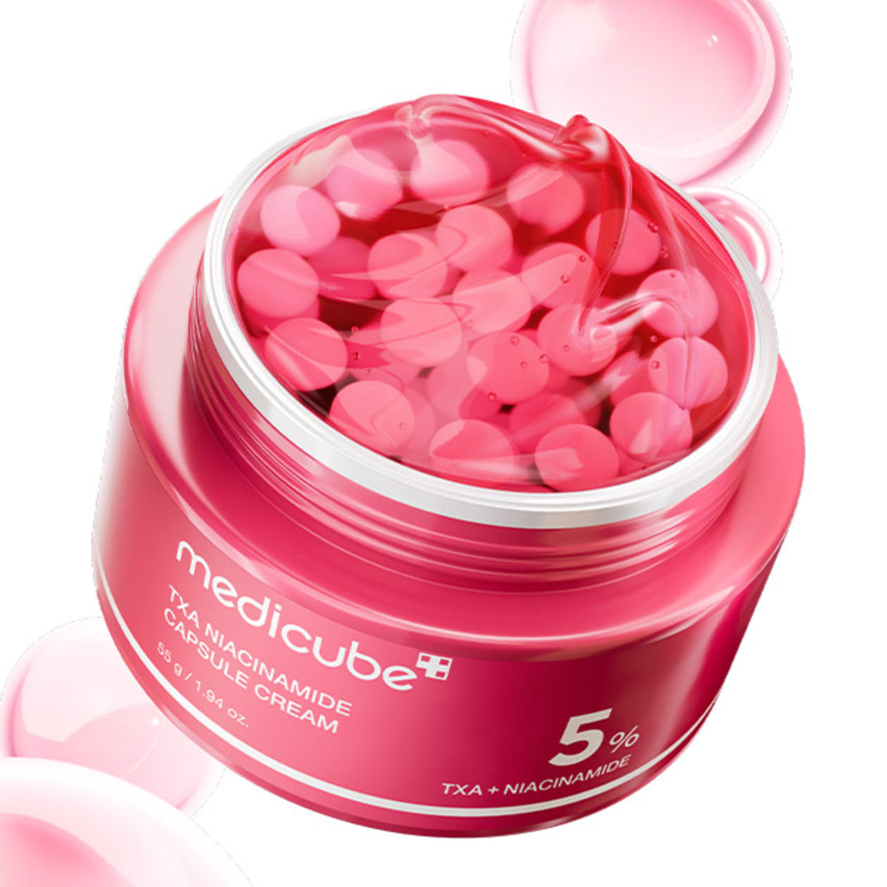 Décris l'image en français en mentionnant le produit, la marque et le contexte visuel : MEDICUBE Tranexamic Acid Freckle Toning Capsule Cream.