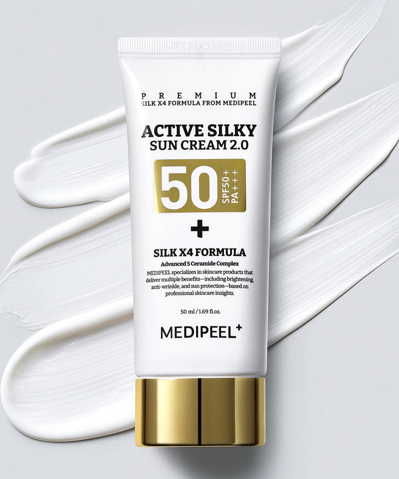 MEDIPEEL Active Silky Sun Cream 2.0 50ml, tube crème solaire sur fond blanc avec texture crème, contexte visuel produit