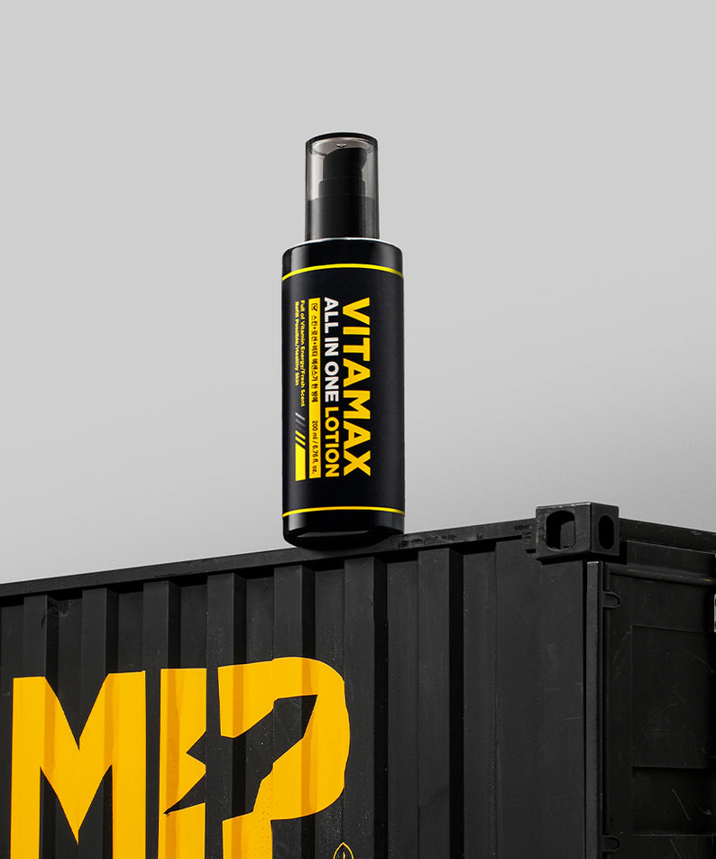 MIP Vitamax Ehitening ALl-in-One Lotion 200ml, flacon sur support noir avec pictogrammes jaune, photo produit.