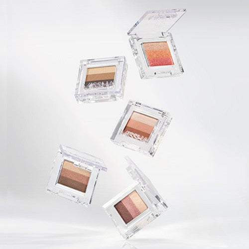 MISSHA  Triple Shadow : palette d’ombres à paupières en packaging transparent, visuel produit sur fond clair.