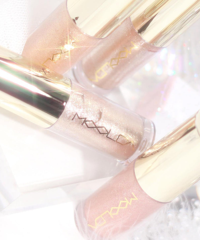 MOOLDA Bonita Glitter Shadow - Ombres à paupières scintillantes en bouteilles dorées, maquillage élégant et lumineux.
