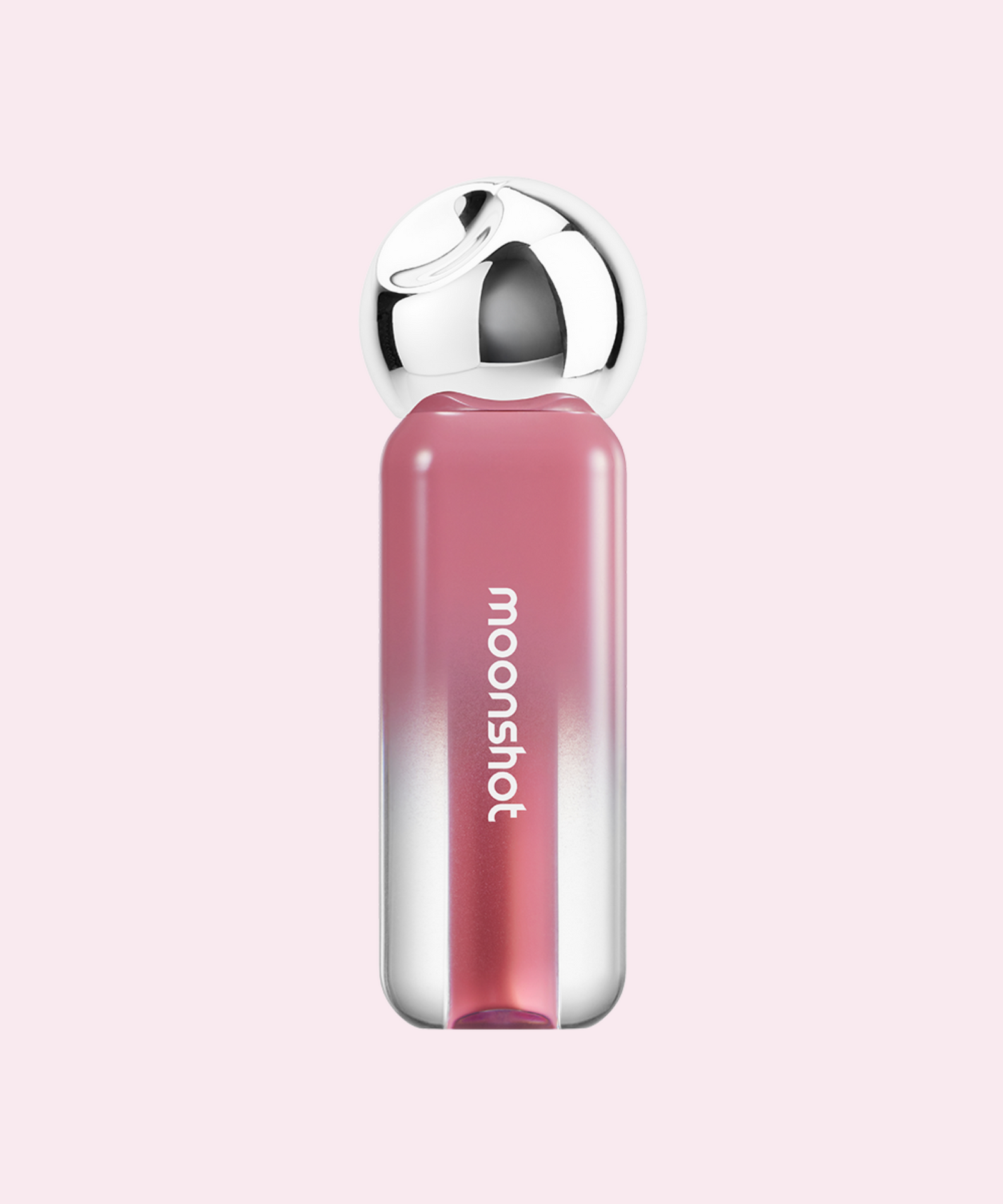 MOONSHOT Jelly Moon Glow Tint de la marque MOONSHOT sur fond rose, flacon brillant, contexte maquillage.