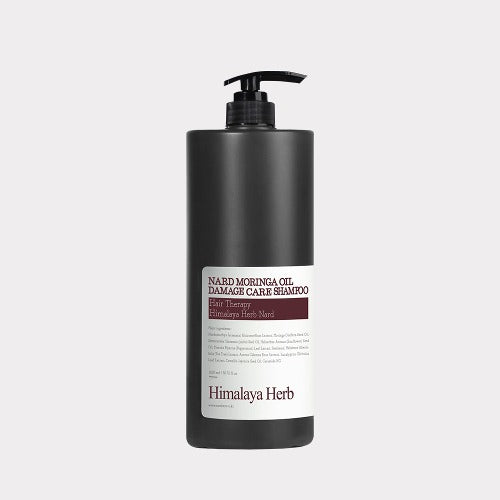 NARD Moringa Oil Damage Care Shampoo 1500ml de la marque NARD, flacon noir avec pompe, sur fond clair.