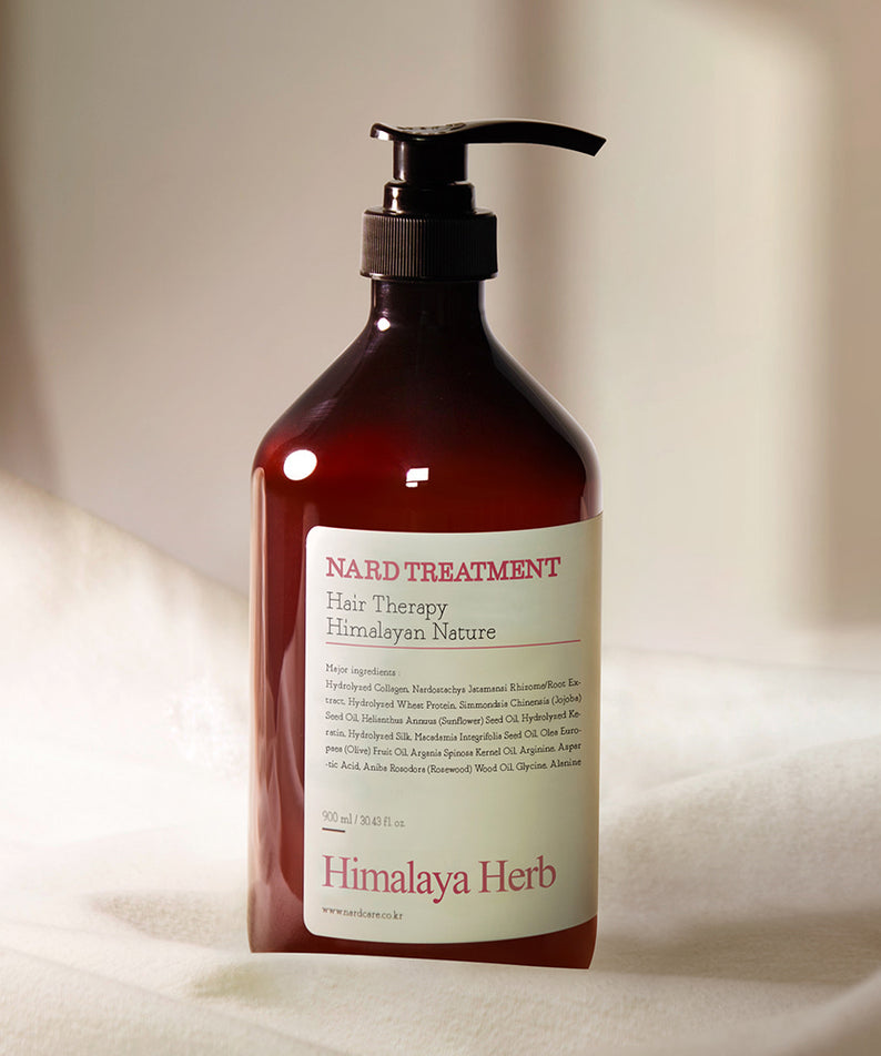 NARD Rose Wood Hair Treatment 1000ml de la marque NARD, bouteille brune avec pompe, sur fond clair, produit cosmétique en photo.