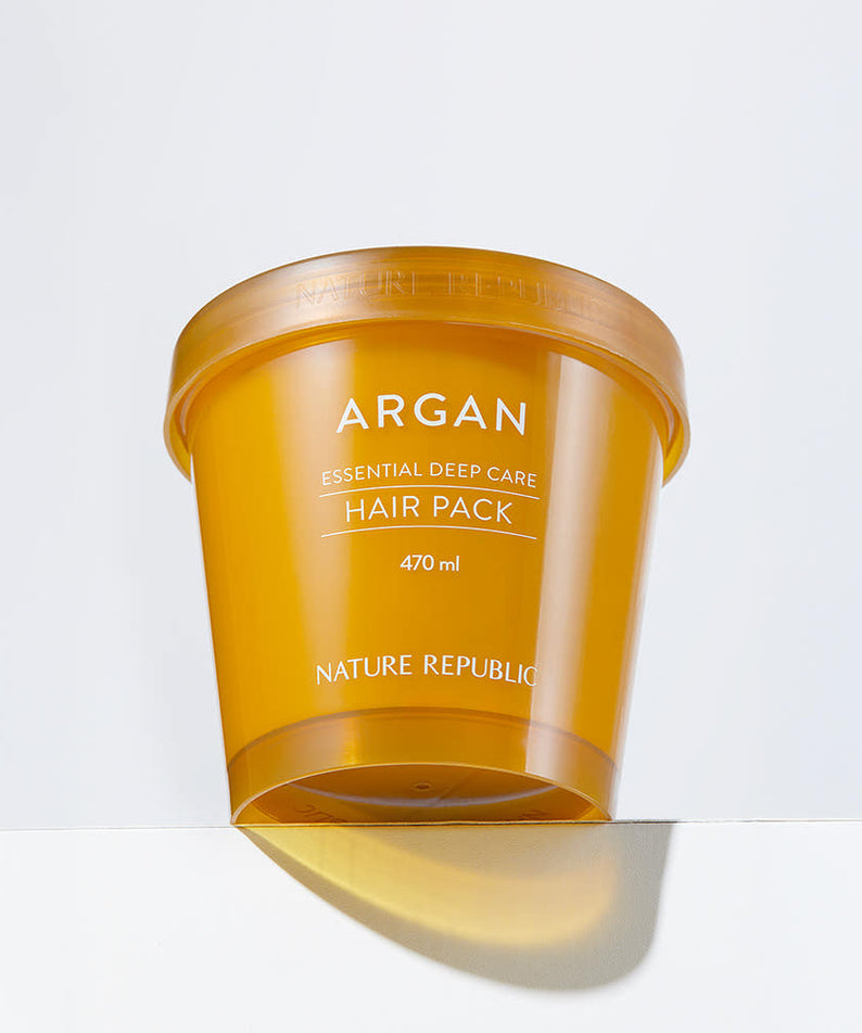 NATURE REPUBLIC Essential Deep Care Hair Pack 470ml : pot Argán sur fond clair, marque en avant-plan, photo produit.