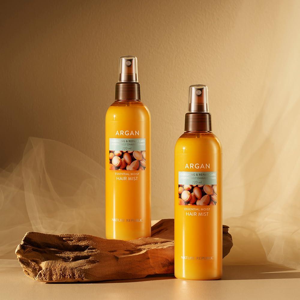 NATURE REPUBLIC Essential Moisture Hair Mist 220ml de la marque, bouteilles sur fond beige avec noix d’argan et mèche