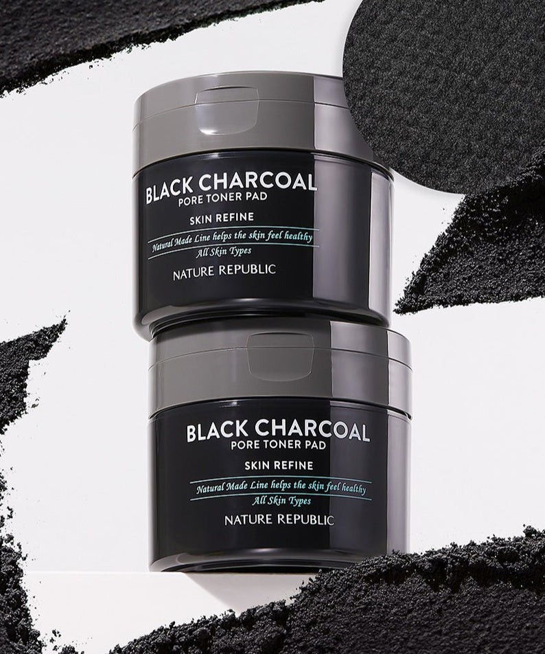 NATURE REPUBLIC Made Black Charcoal pore Toner Pads 100g, disques de soin pour pores, image produit montrant packaging élégant.