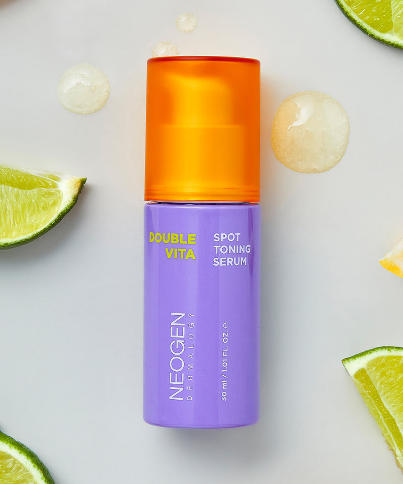 NEOGEN Double Vita Spot Toning Serum 30ml de la marque NEOGEN, sur fond blanc avec limes et gouttes de gel.