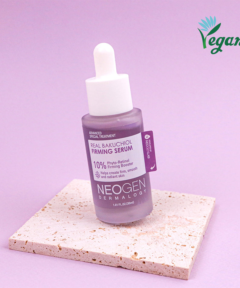 NEOGEN Real Bakuchiol Firming Serum 30ml par NEOGEN, flacon sur fond lilas avec plaque texturée (Vegan)
