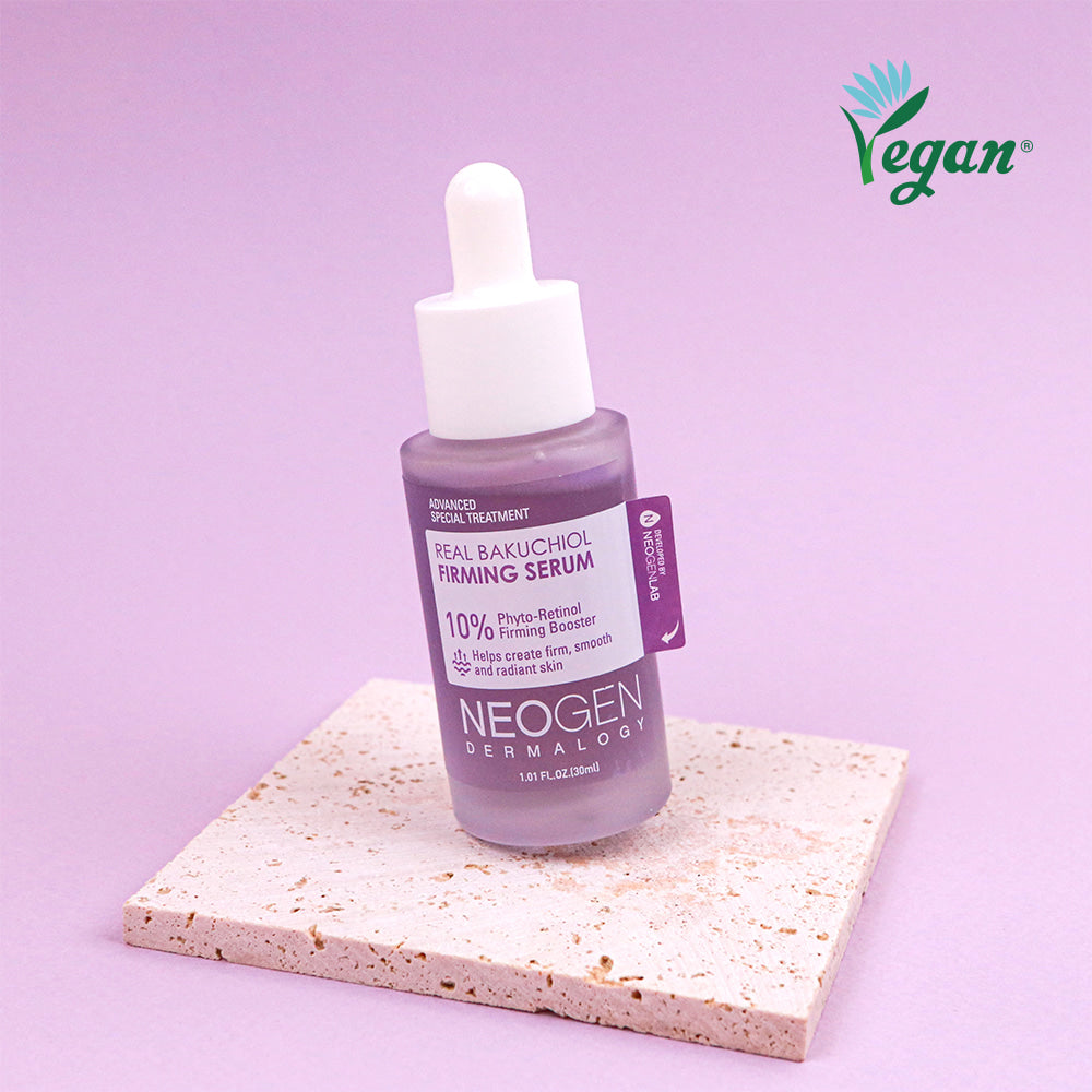 NEOGEN Real Bakuchiol Firming Serum 30ml par NEOGEN, flacon sur fond lilas avec plaque texturée (Vegan)