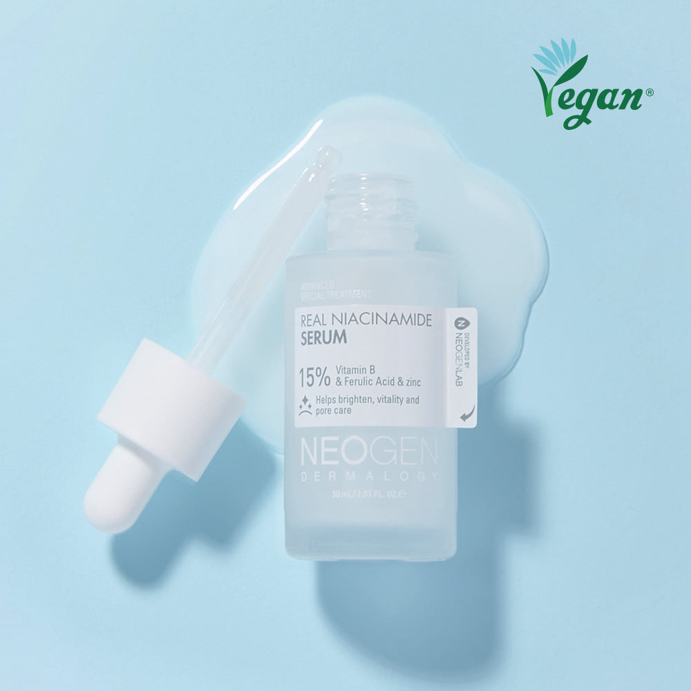 NEOGEN Real Niacinamide 15% Serum 30ml de la marque NEOGEN, sur fond bleu clair, flacon gouttes végétal vegan
