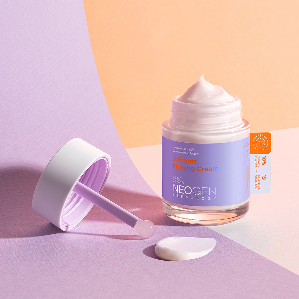 NEOGEN V Biome Firming Cream 60g de NEOGEN, pot crème et spatule sur fond violet/or, texture onctueuse