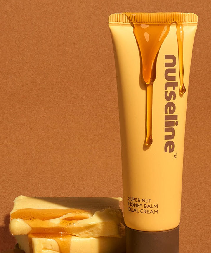 NUTSELINE  Super Nut Honey Balm Dual Cream 60ml, tube crème miel et extrait noisette sur fond beige, visuel produit