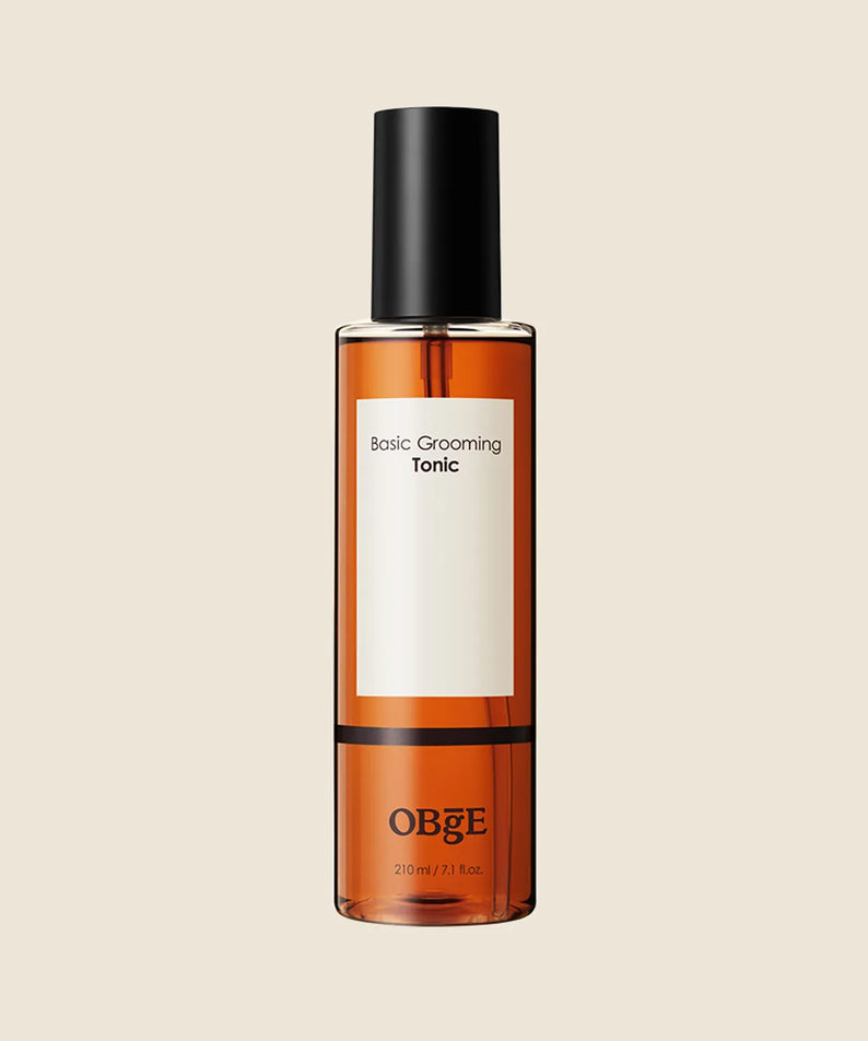 OBGE Basic Grooming Tonic 210ml, flacon ambré avec bouchon noir sur fond clair, produit de marque OBGE