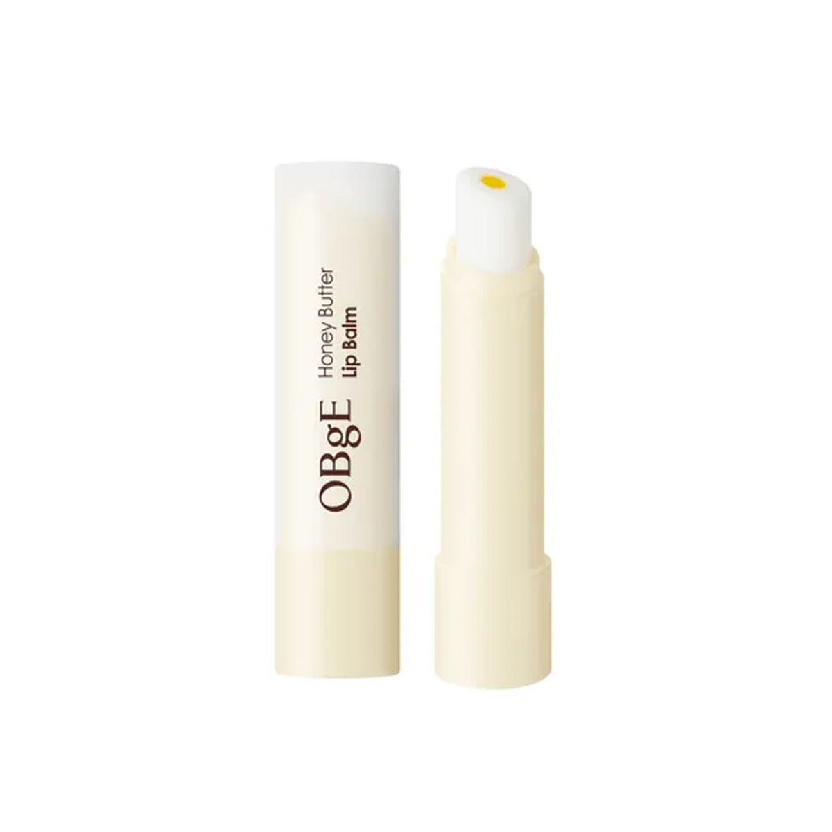 OBGE Honey Butter Lip Balm de la marque OBGE, stick baume à lèvres à la texture miel-beurre sur fond blanc