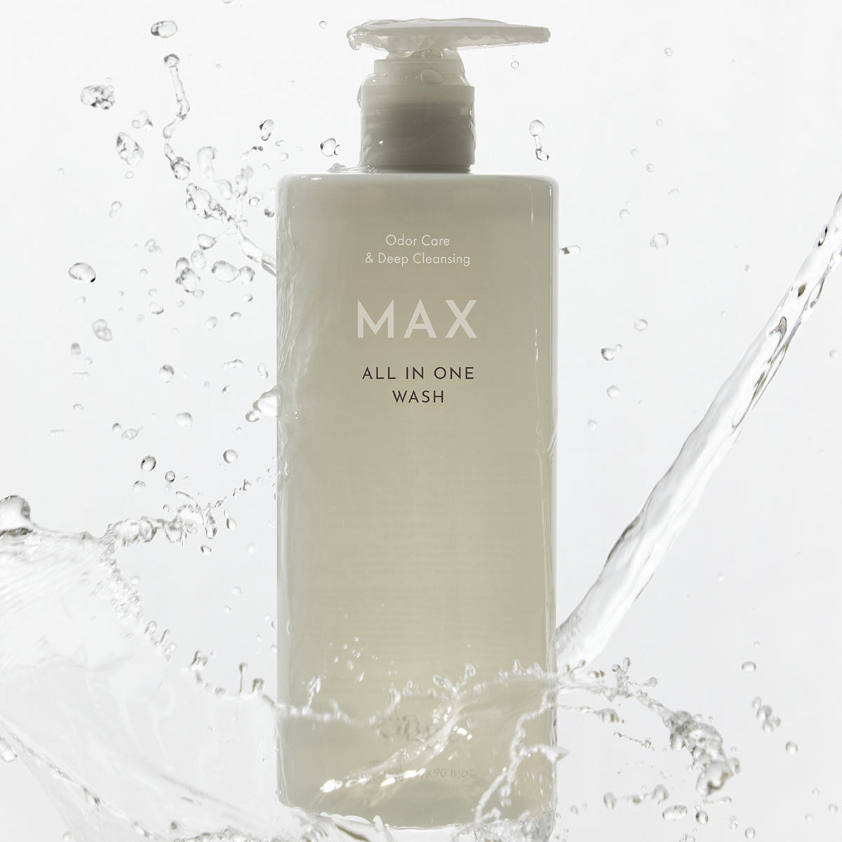 OBGE Max All-in-One Wash 500ml, bouteille OBGE au design MAX, éclaboussures d’eau sur fond blanc.