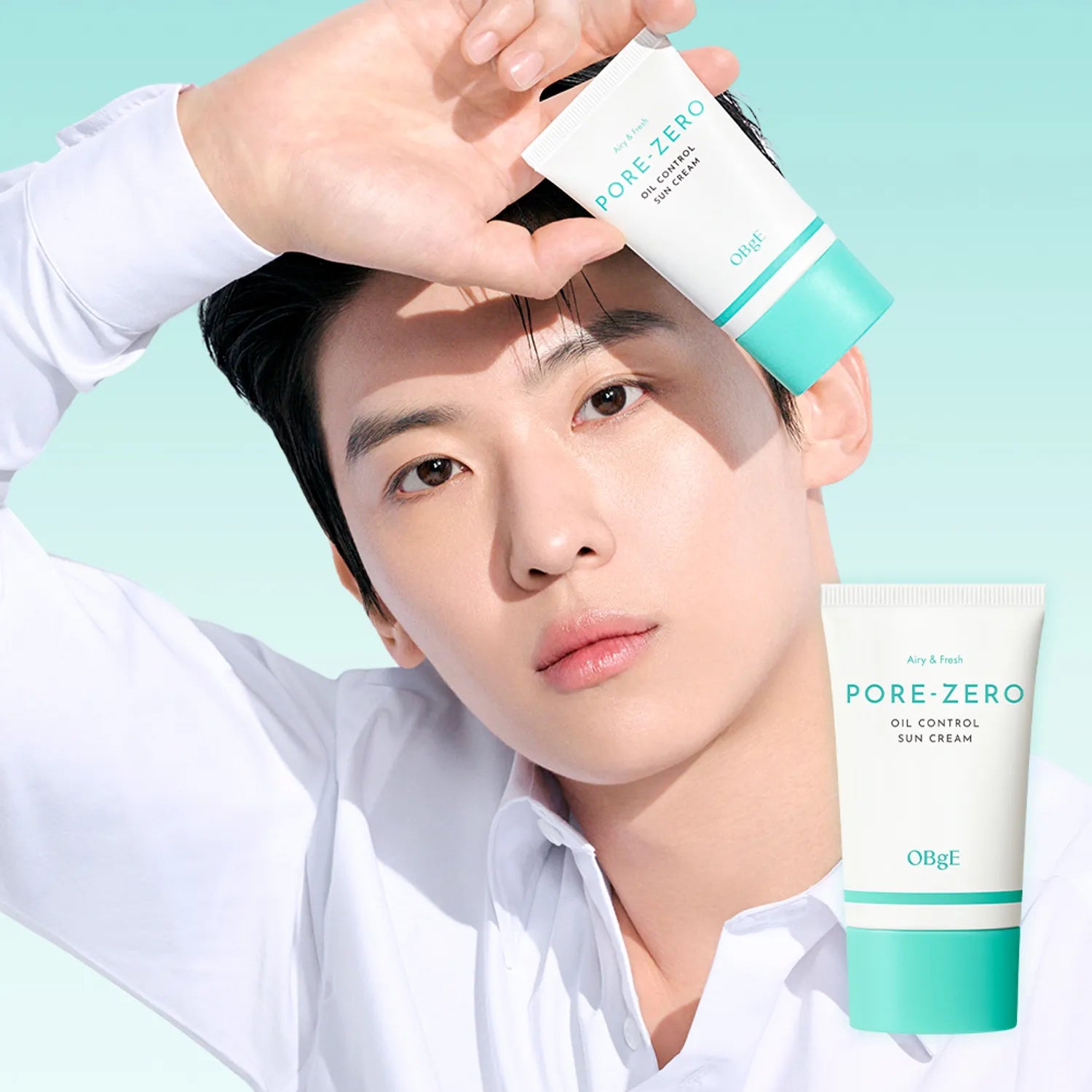 OBGE Pore Zero Oil Control Sunscreen 50ml, crème solaire anti-brillance, marque OBGE, main applique sur visage en extérieur