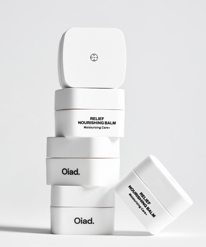OIAD Relief Nourishing Lip Care Balm 4g, baume pour les lèvres OIAD, présenté sur fond blanc en studio.
