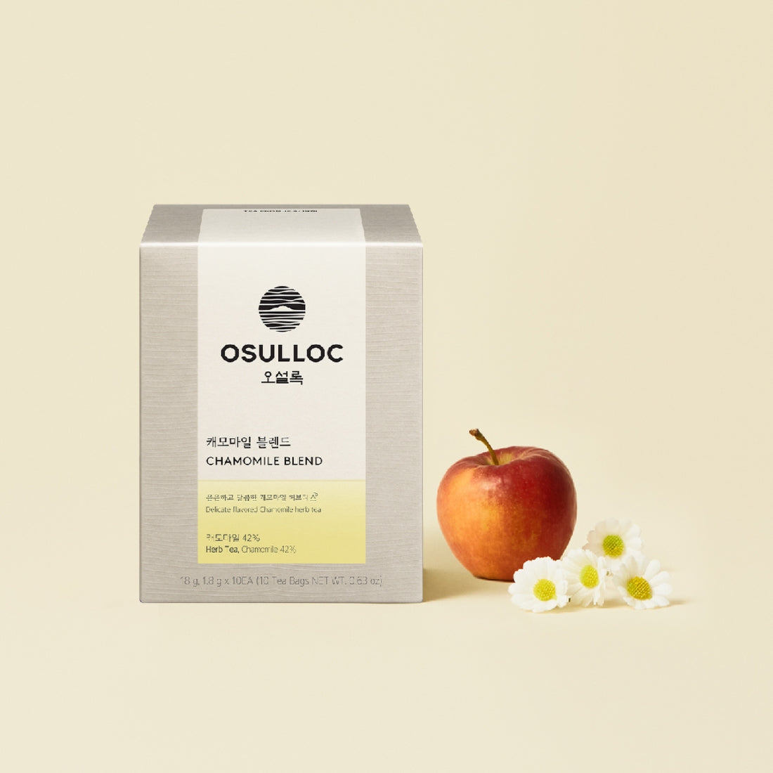 OSULLOC Chamomile Blend 10 p : boîte avec fleurs de camomille et pomme, fond beige, style produit minimaliste