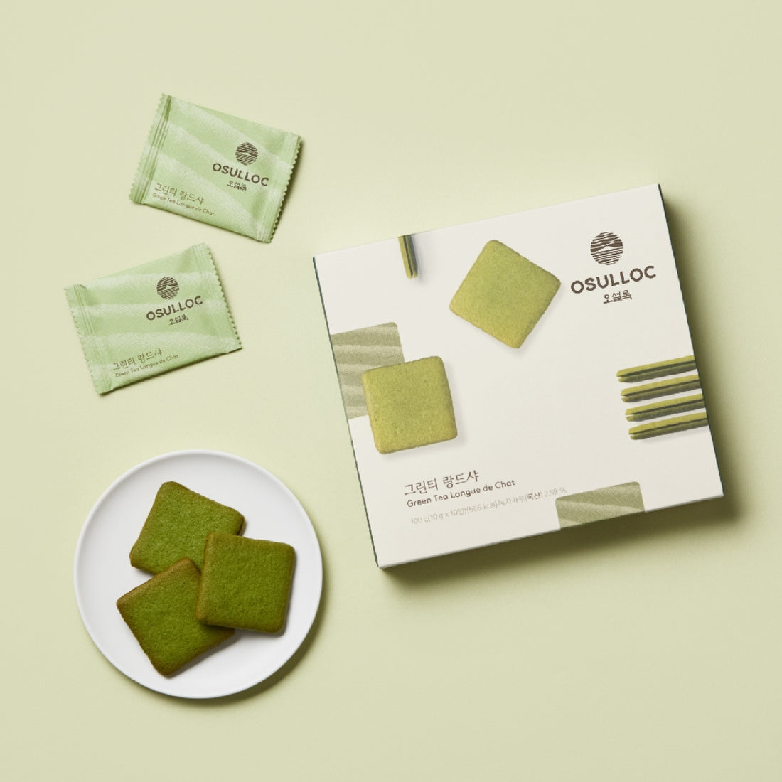 OSULLOC Green Tea Langue de chat 10 p : biscuits verts et sachets OSULLOC, présentés sur fond clair, vue produit.