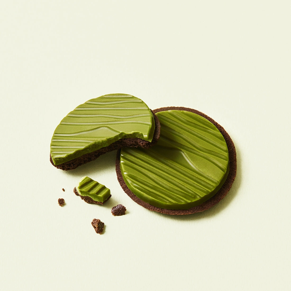 OSULLOC Signature Biscuits 10 P : biscuits au matcha en forme de galettes, disposés sur fond clair, ambiance gourmande.