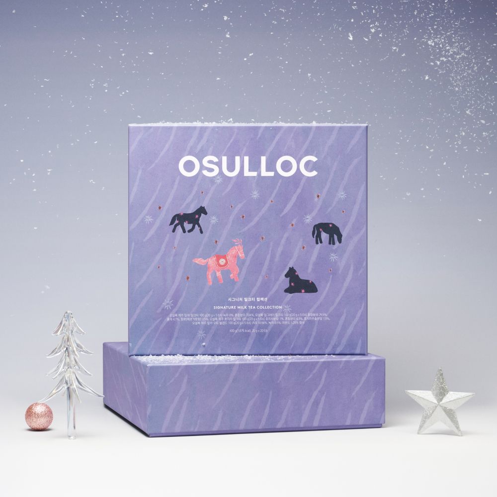 OSULLOC Signature Milk Tea Collection : coffret de thé au lait au design hivernal, décor blanc avec étoiles et sapin.