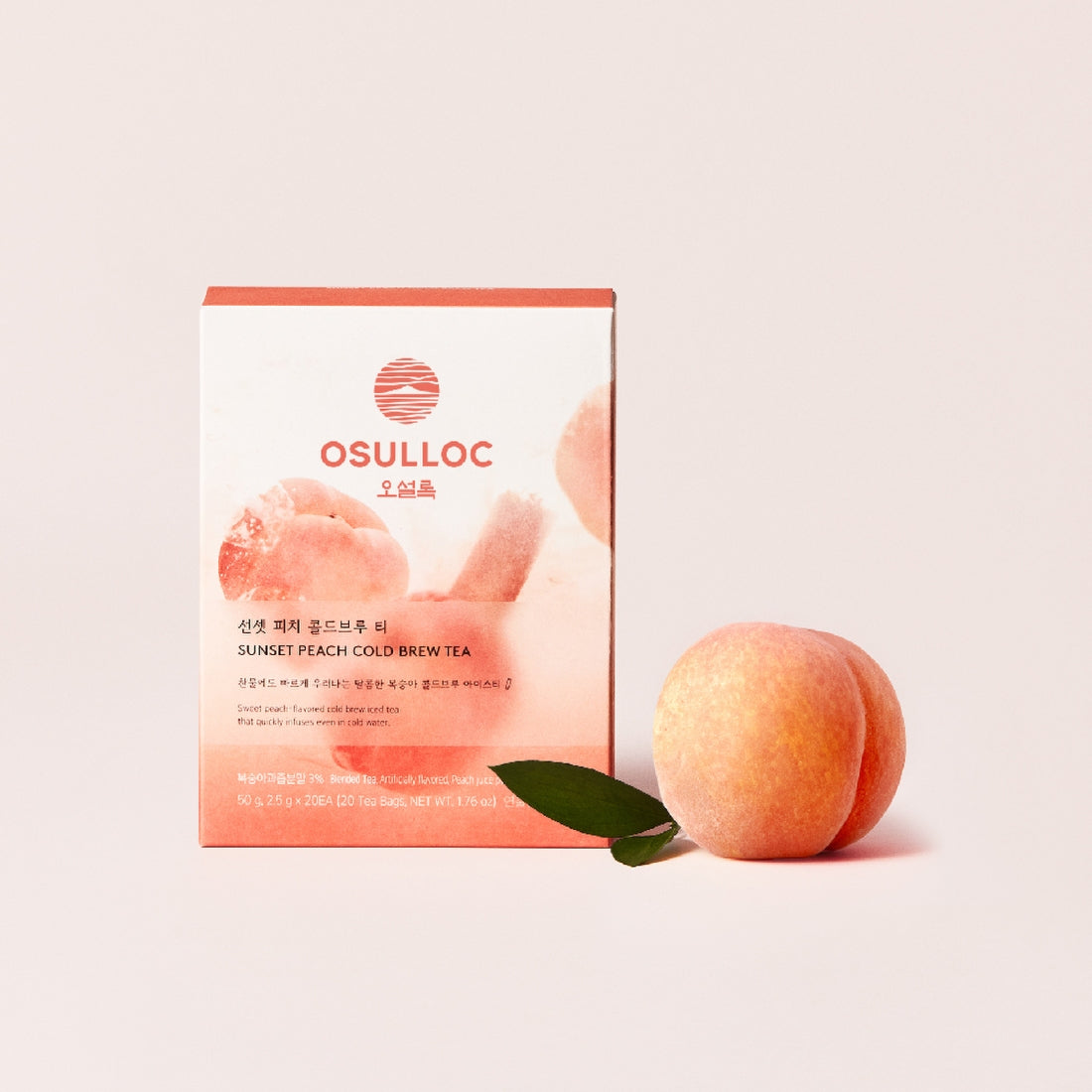 OSULLOC Sunset Peach Cold Brew Tea 20 P : boîte et pêche sur fond clair, ambiance estivale.