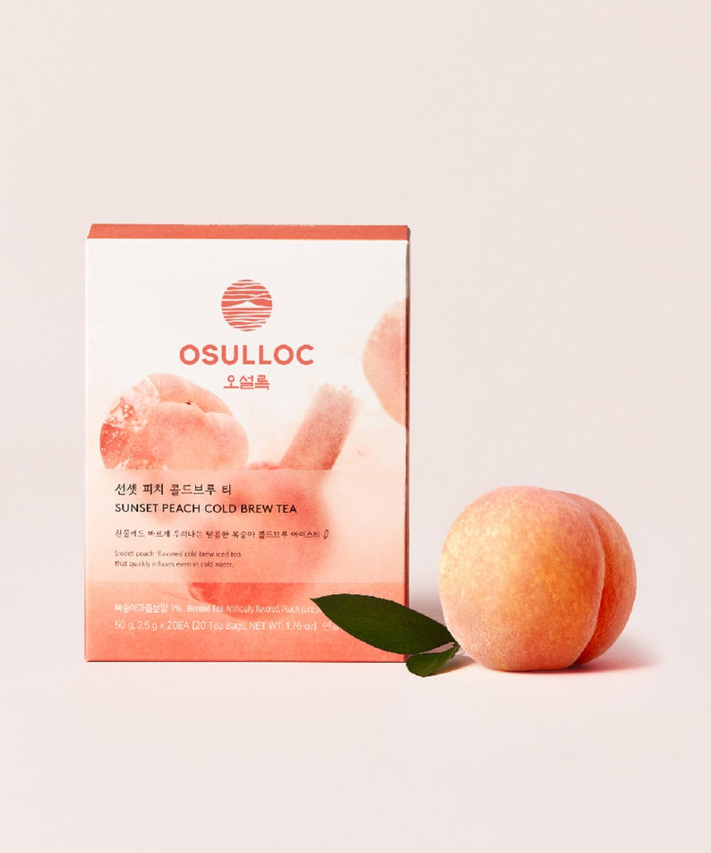 Boîte de thé OSULLOC Sunset Peach Cold Brew Tea 20 P avec pêche fraîche en fond rose
