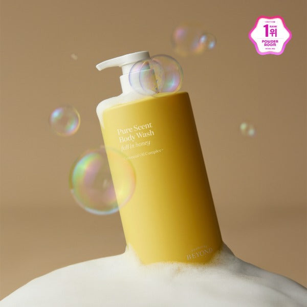 PASSON & BEYOND Pure Scent Full-in-Honey Boday Wash 700g, gel douche miel sur fond beige avec bulles, flacon blanc.