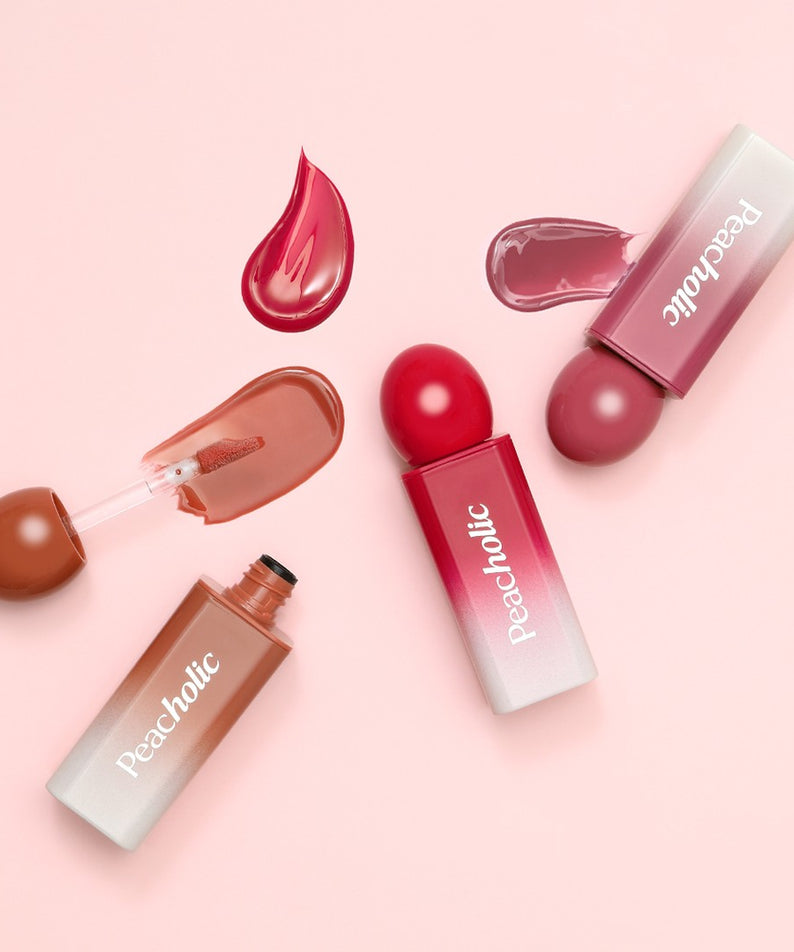 PEACHOLIC Water Glow Lip Tint de la marque PEACHOLIC sur fond rose, présentation cosmétique avec teintes brillantes