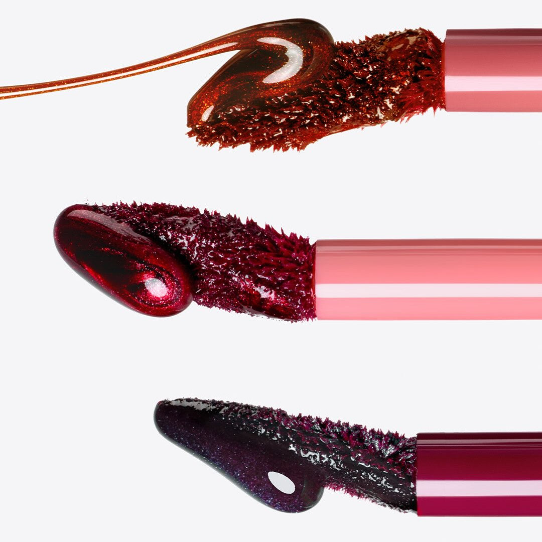 PERIPERA Ink Peel-Off Lip Stain, gros plan sur l’embout et la texture en teinte bordeaux, sur fond blanc.