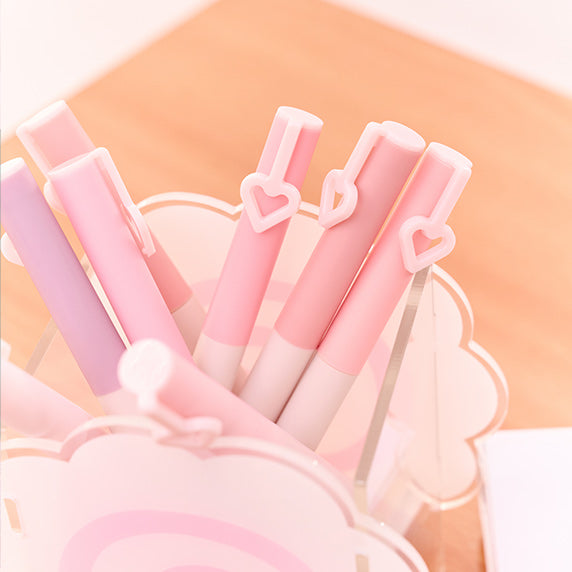 PERIPERA Mood in Shade Eye Stick de PERIPERA, sticks roses sur fond pastel, présentation maquillage en gros plan.