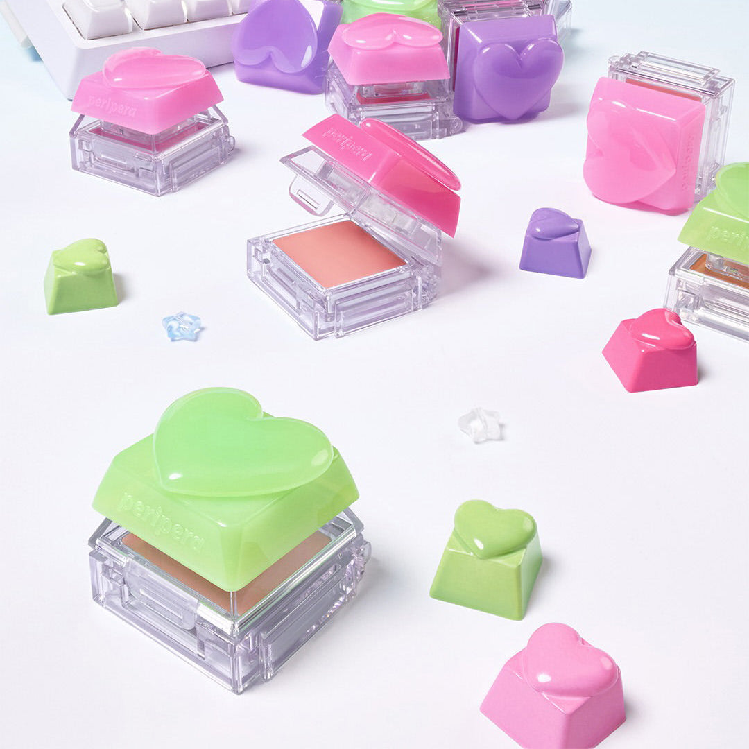PERIPERA Talk Blush Keycap, la marque PERIPERA : keycaps roses et violets sur fond blanc, produits en contexte maquillage.