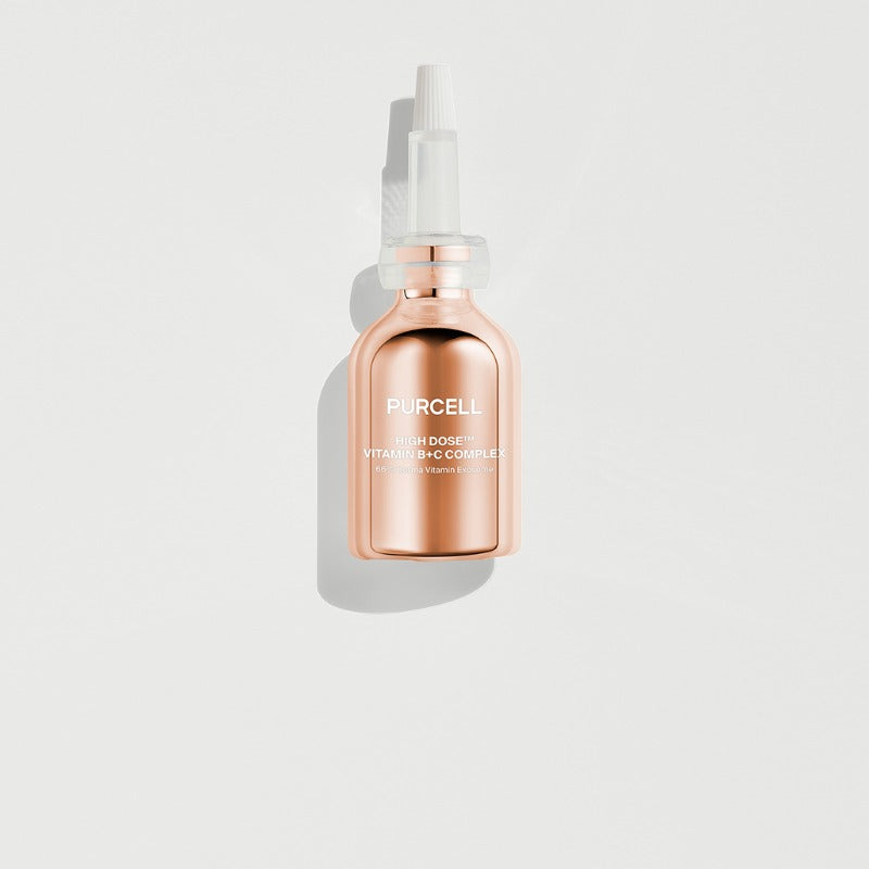 PURCELL High-Dose Vitamin B+C Complex 30mL, flacon spray rose PURCELL sur fond clair, produit cosmétique lumineux