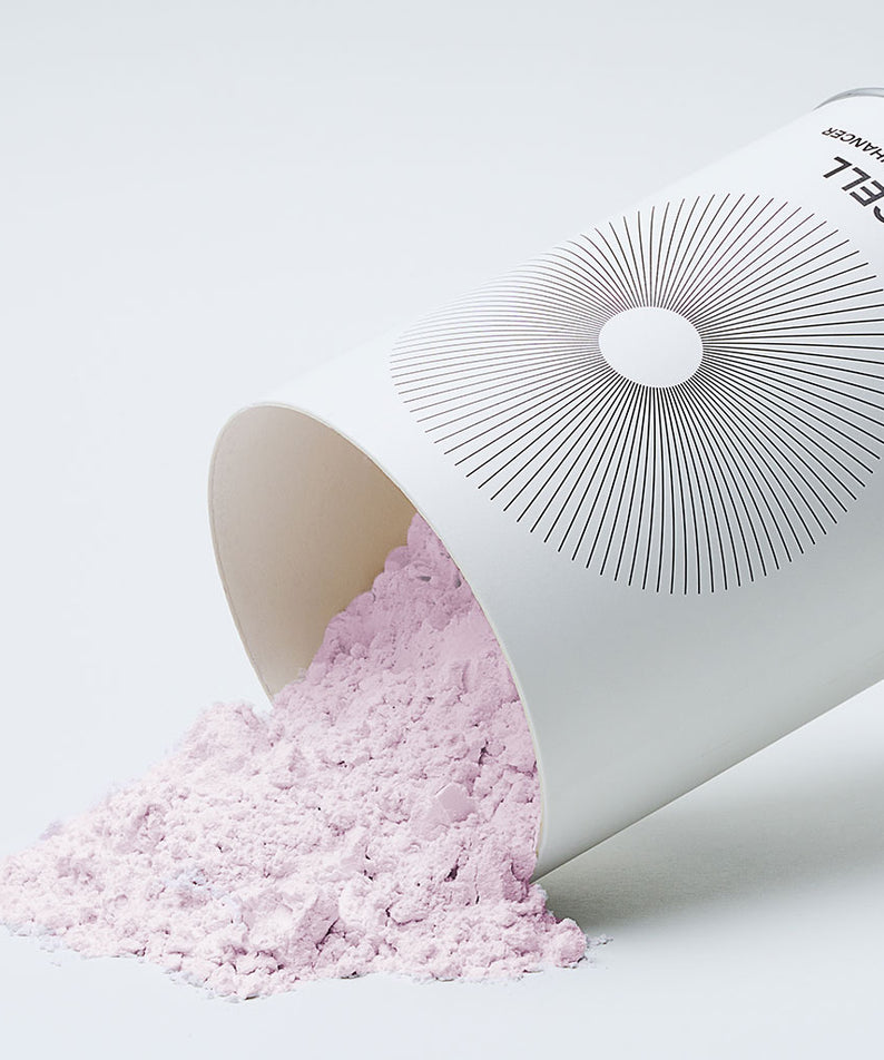 PURCELL PixelBiome™ O₂ Enhancer Modeling Mask de PURCELL, poudre rose et flacon sur fond blanc, visuel produit