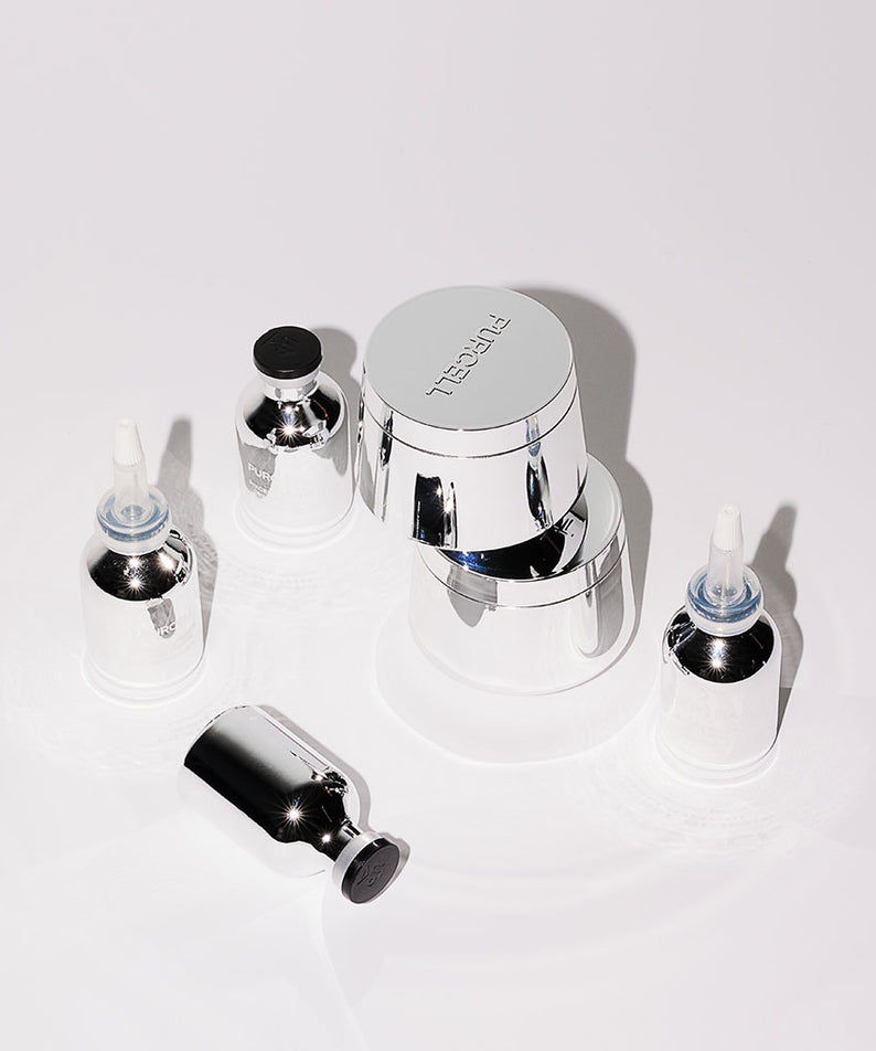 PURCELL PixelBiome™ Set (30mL of concentrate + 50mL of cream), flacons et crème PURCELL sur fond blanc, visuel produit.