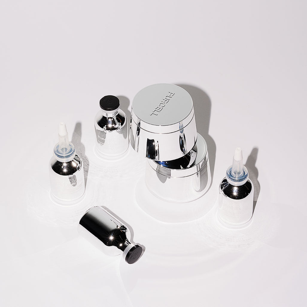 PURCELL PixelBiome™ Set (30mL of concentrate + 50mL of cream), flacons et crème PURCELL sur fond blanc, visuel produit.